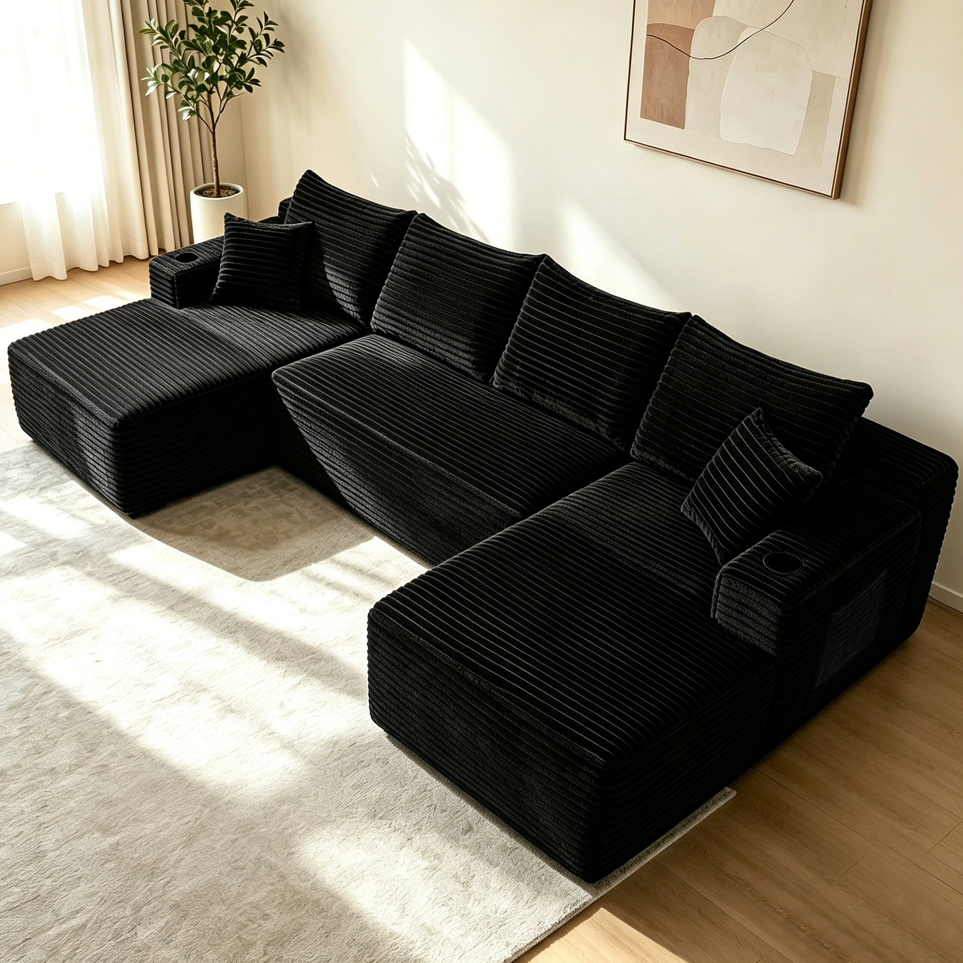 Black U-shape chaise sectional sofa, side profile view
