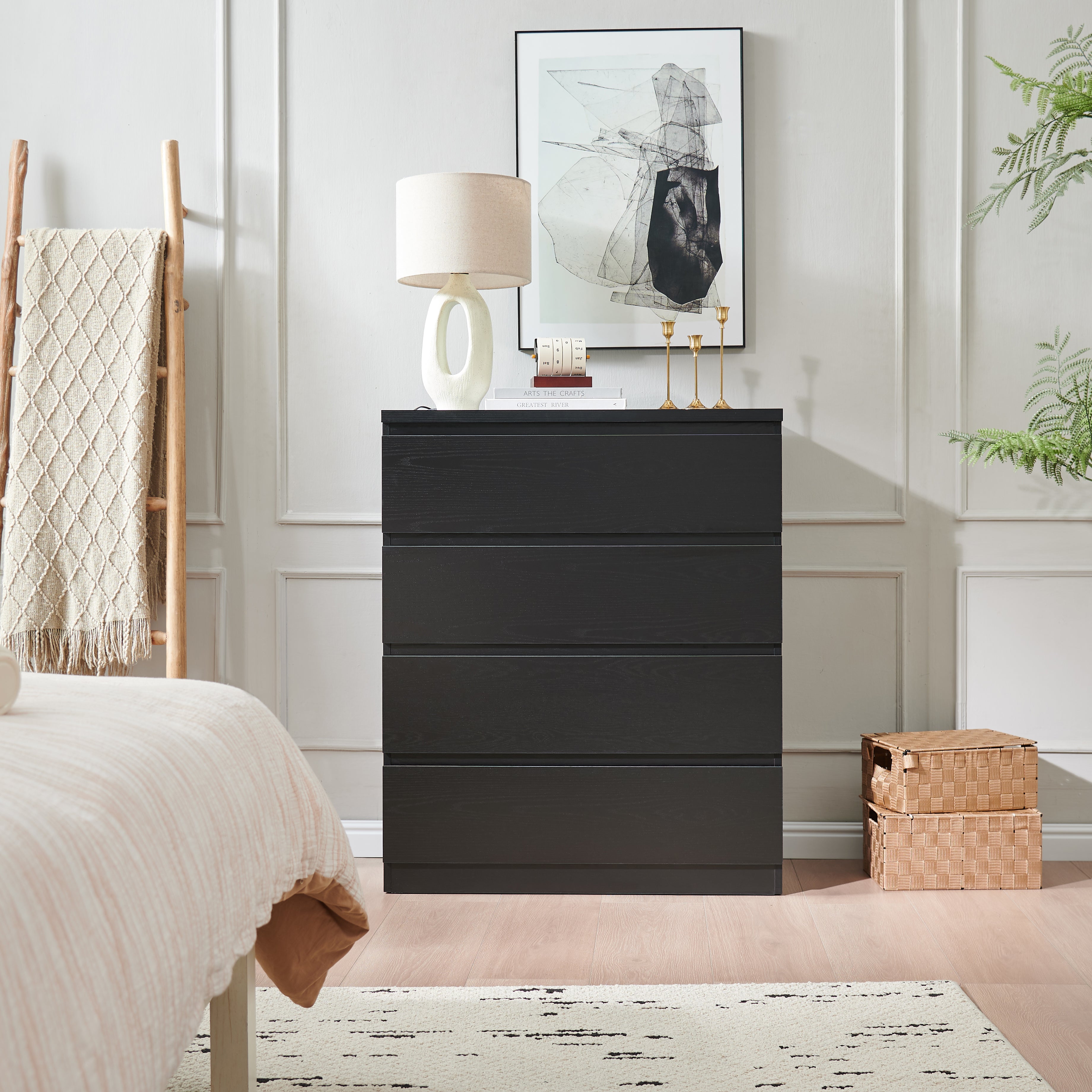 Handle-free black dresser with drawers open, storage view