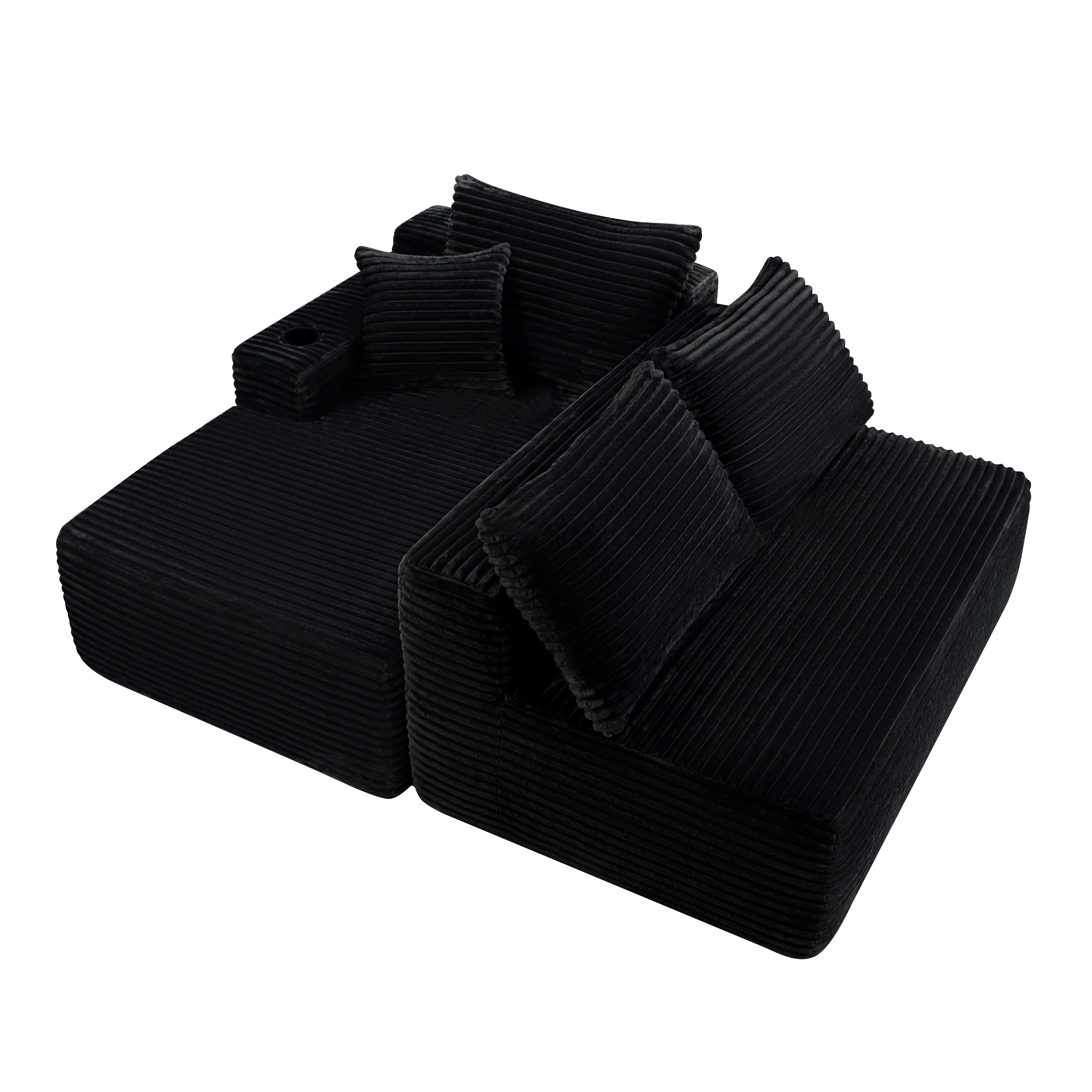 Black plush sectional sofa cup holder detail view