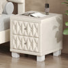 Beige velvet button-tufted bedside table, angled view