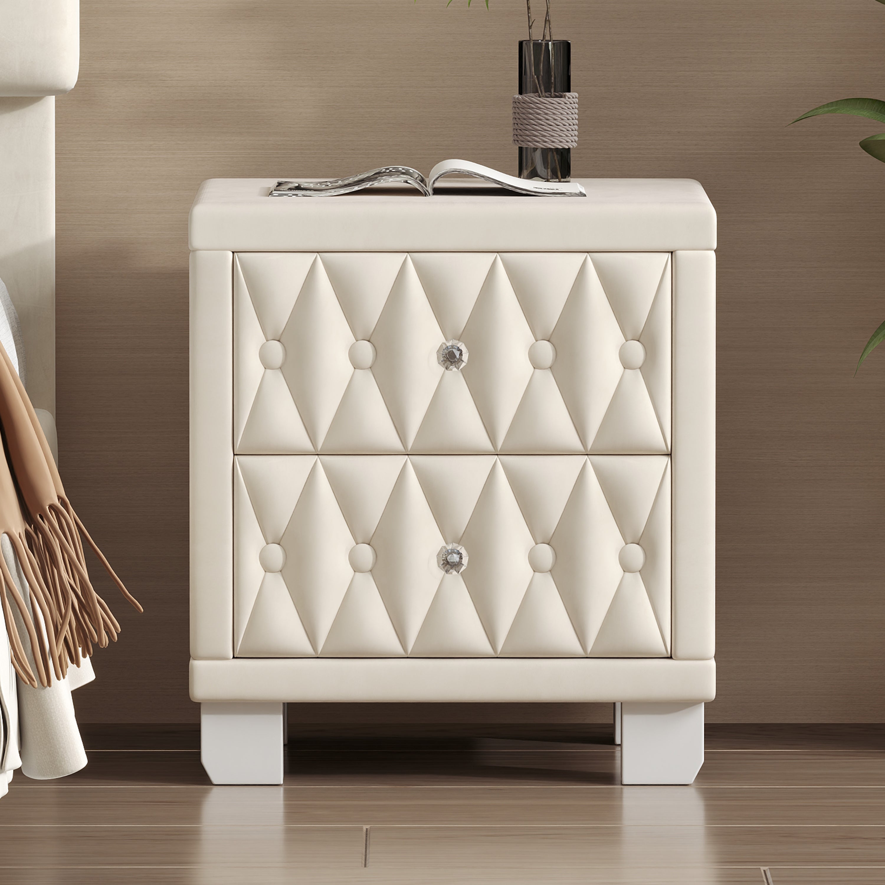Beige velvet nightstand with crystal drawer handle detail