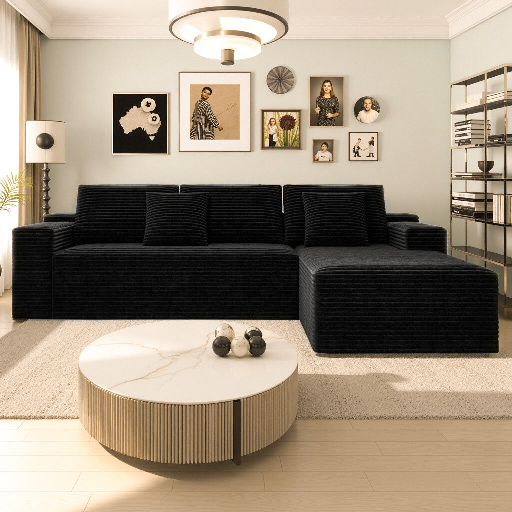 Black corduroy sectional sofa, side profile view