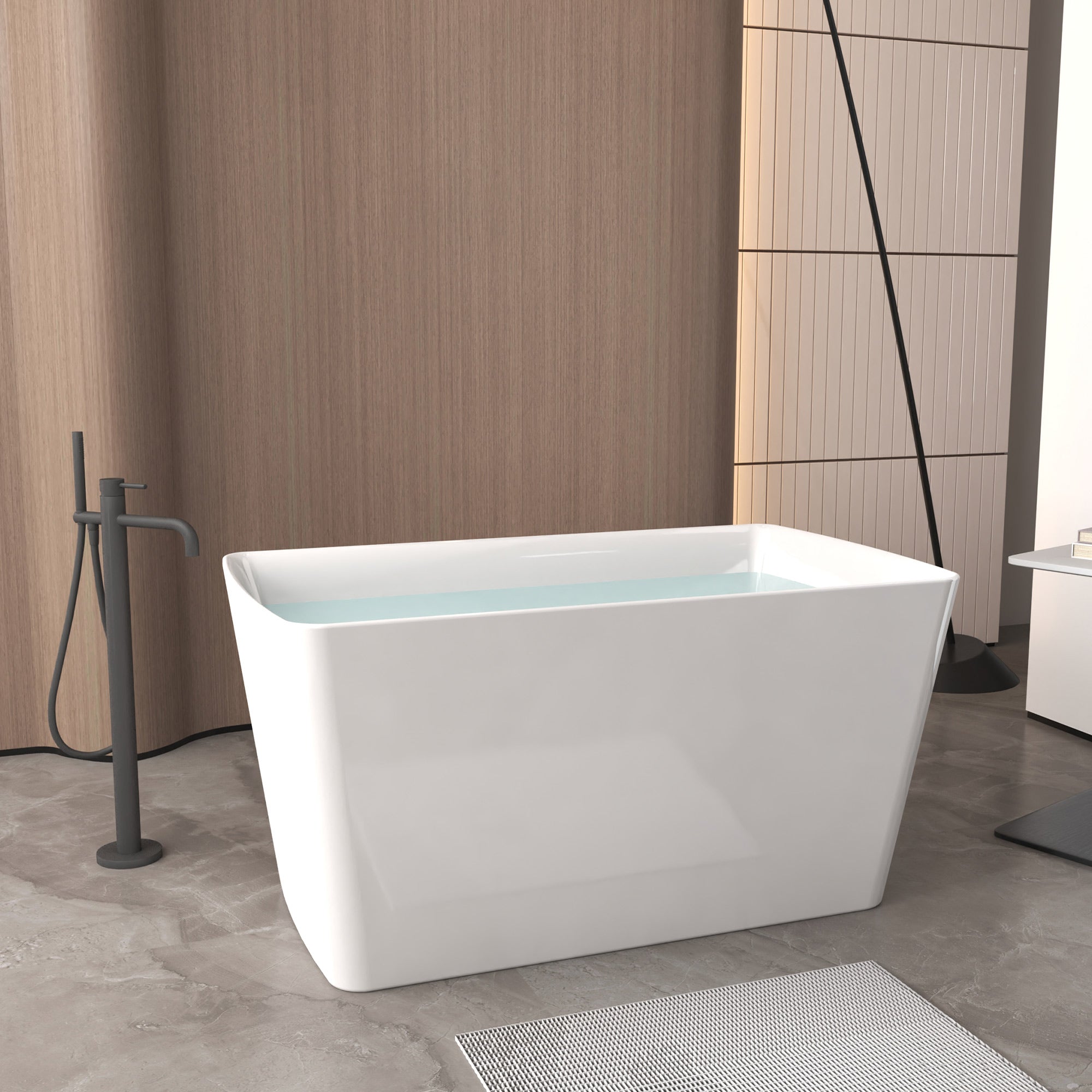 47-inch gloss white bathtub showing chrome pop-up drain detail