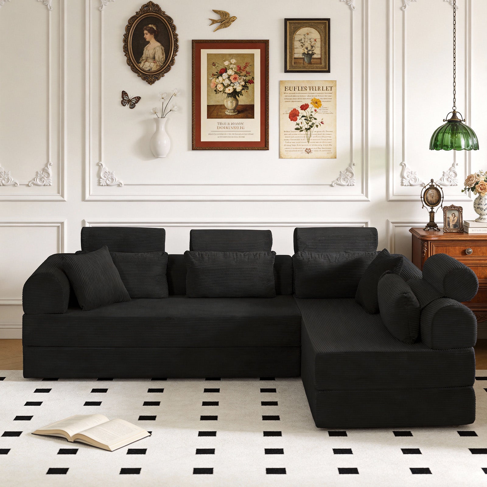 Black corduroy sectional sofa, angled view showing L-shape layout