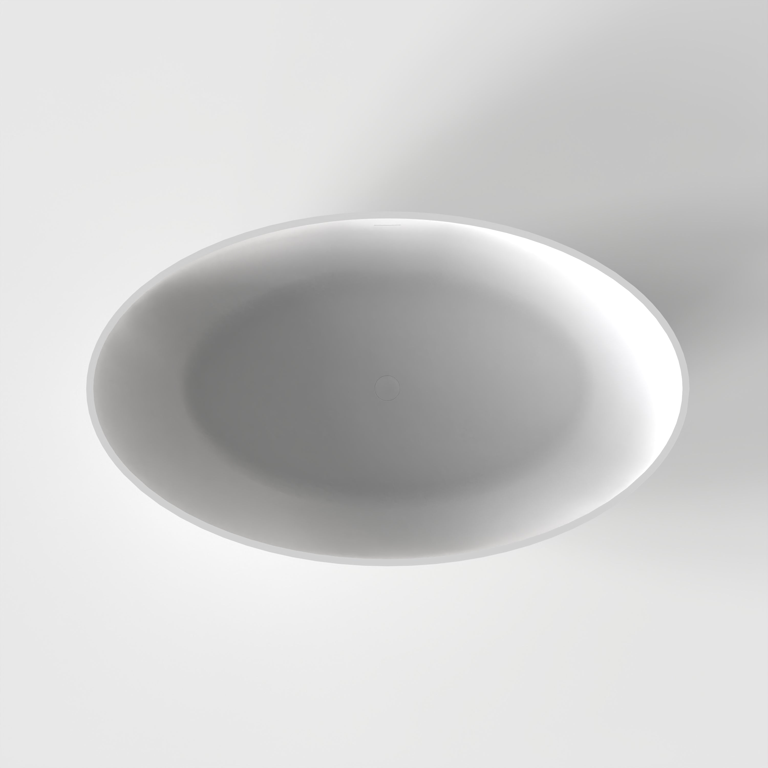 Freestanding solid surface soaking bathtub, drain end view