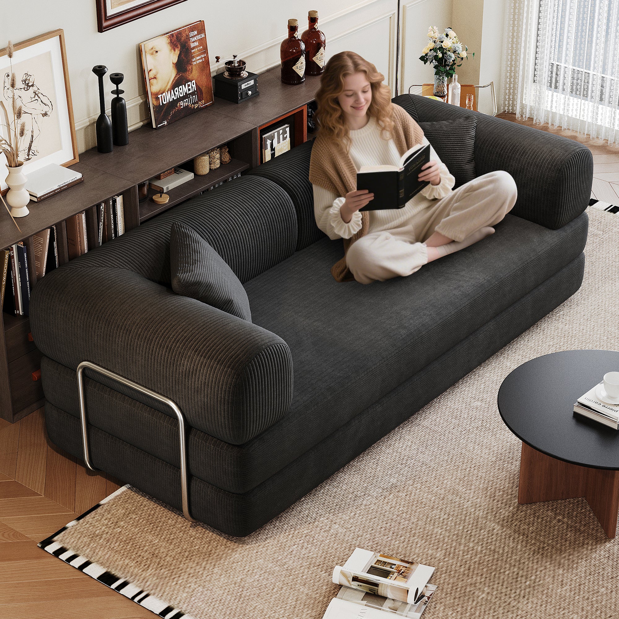 Black corduroy modular sectional sofa bed with pillow back, side view