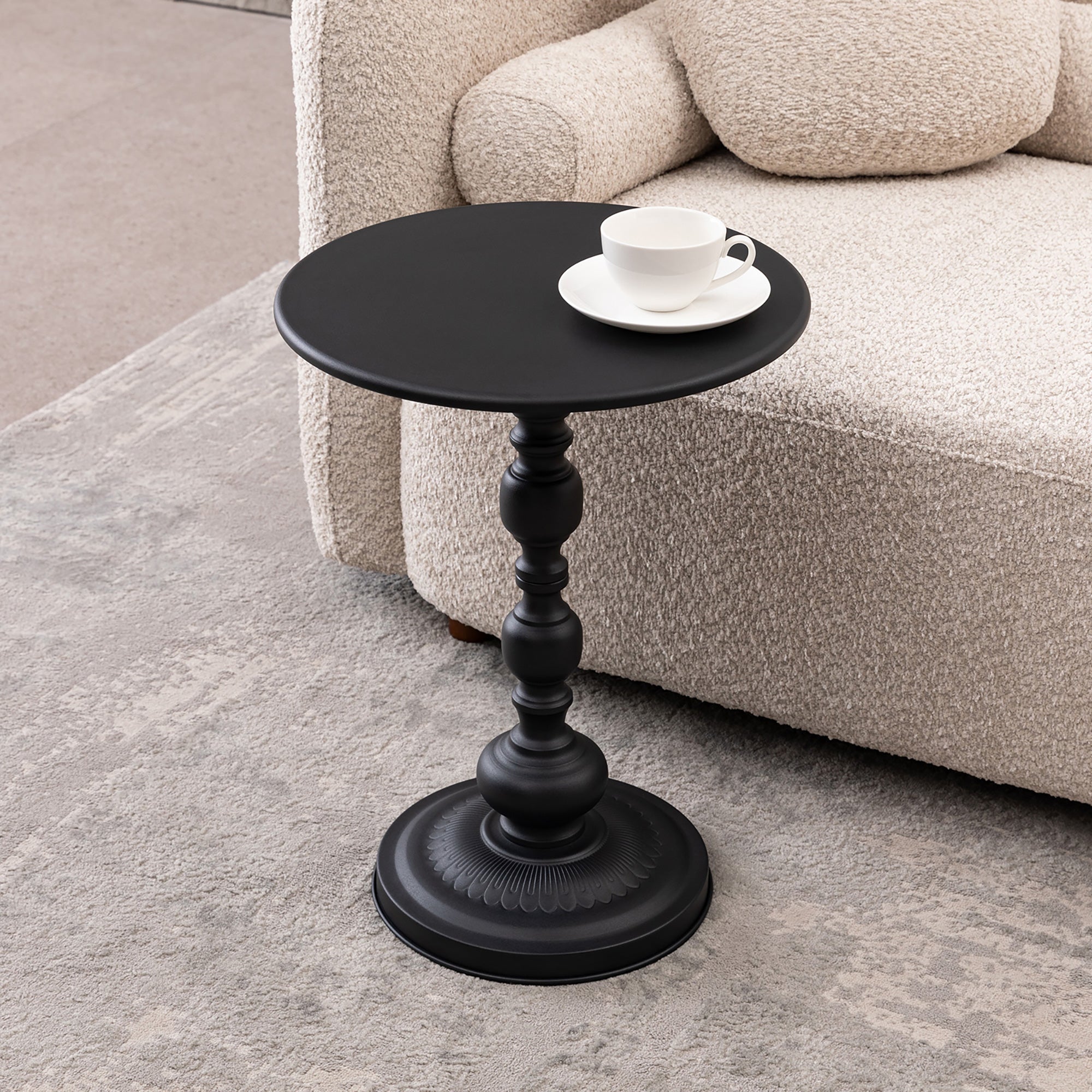 Round vintage metal accent end table, angled view