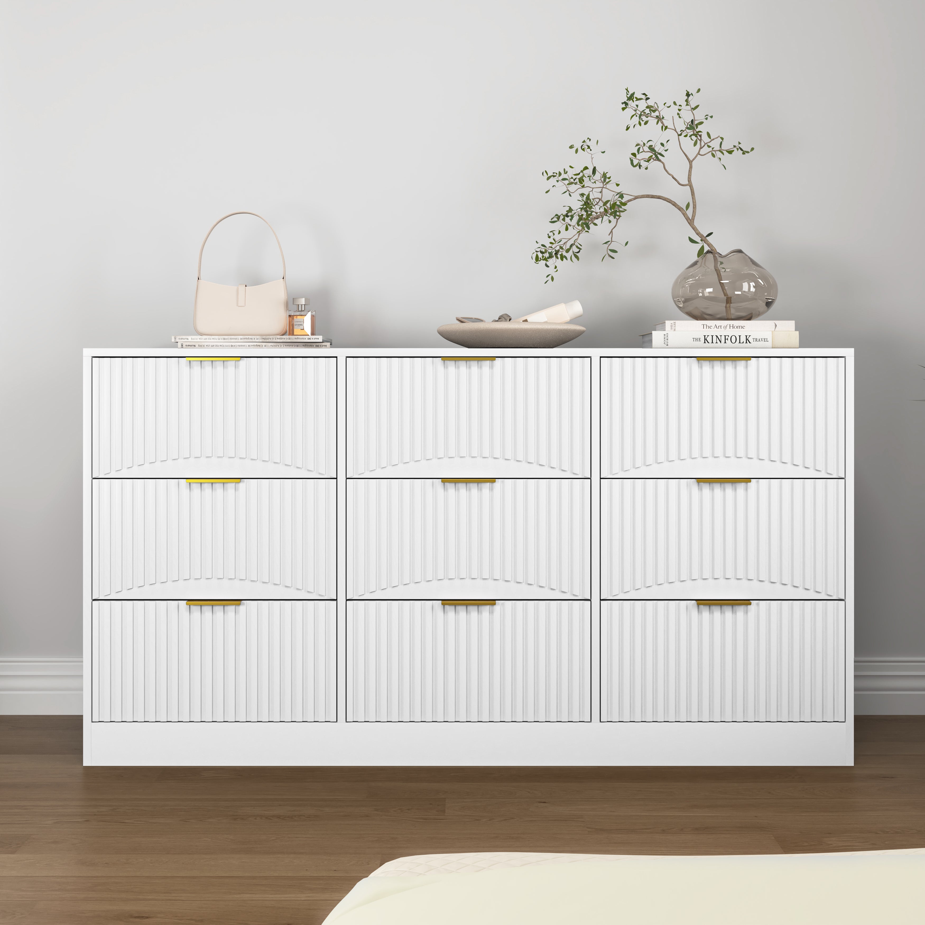White wooden dresser wavy-pattern drawer front close-up