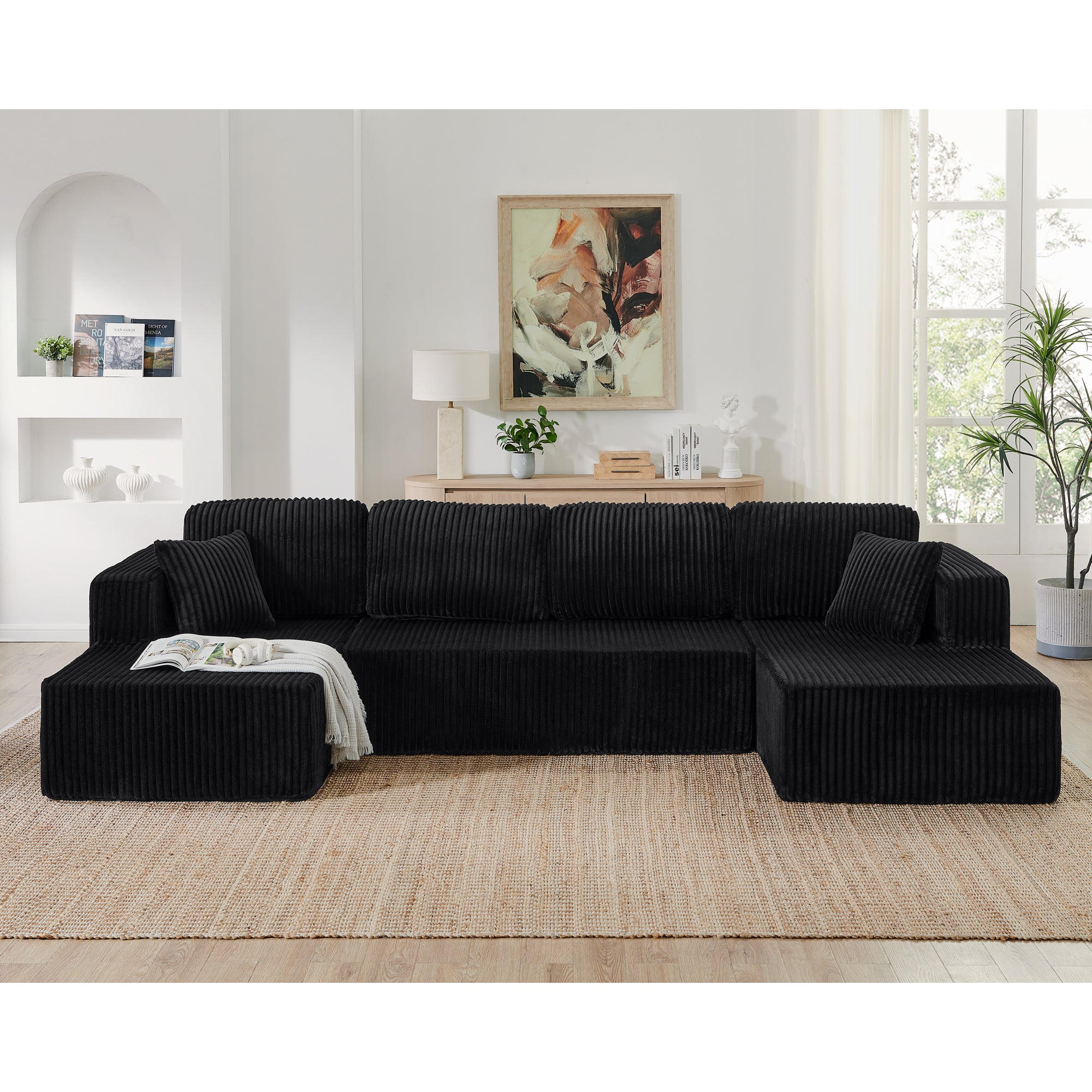 Modular sectional sleeper sofa in black corduroy, seating detail