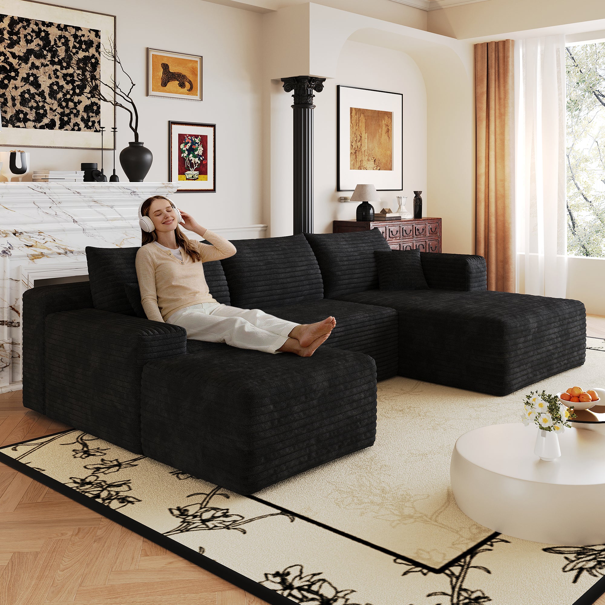 Black corduroy sectional sofa, deep seat corner couch, angled view