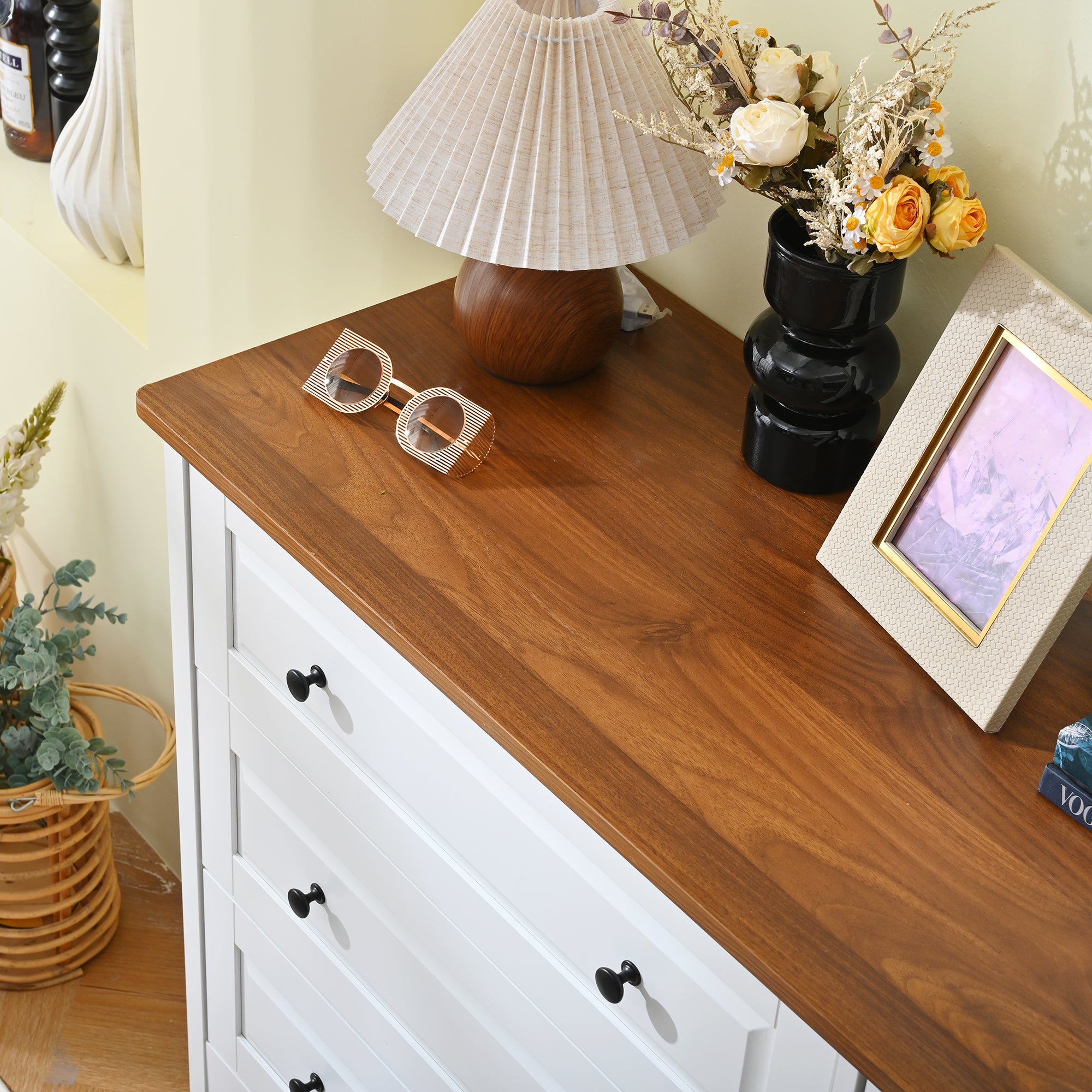 White chest of drawers with wide drawer open, detail view